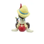 6011934 Wishful and Wise Pinocchio and Jiminy Sitting Disney Traditions by Jim Shore Enesco - immagine 2