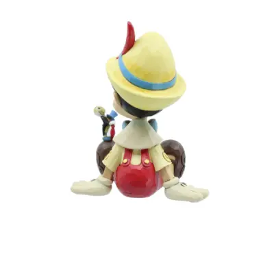 6011934 Wishful and Wise Pinocchio and Jiminy Sitting Disney Traditions by Jim Shore Enesco - immagine 2